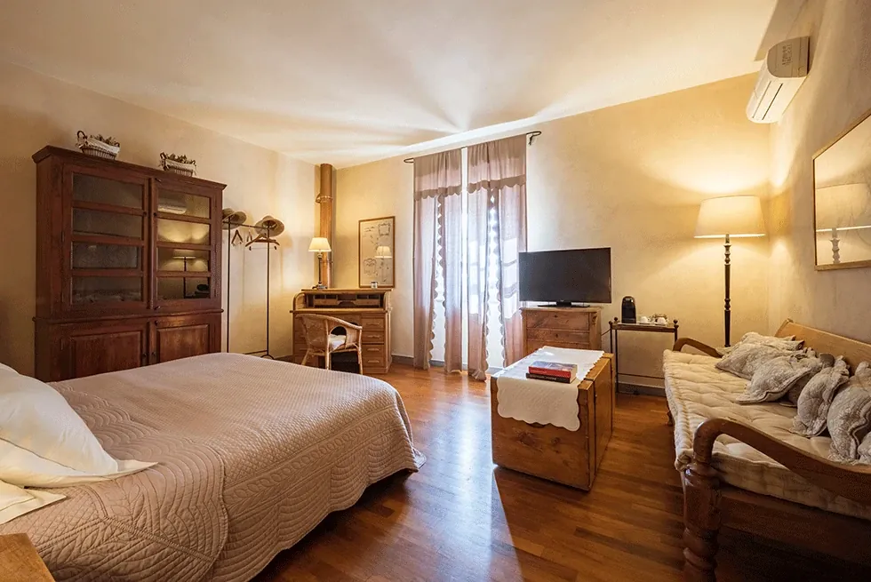 Fattoria Standard Room – junior suite letto matrimoniale relais poggio ai santi